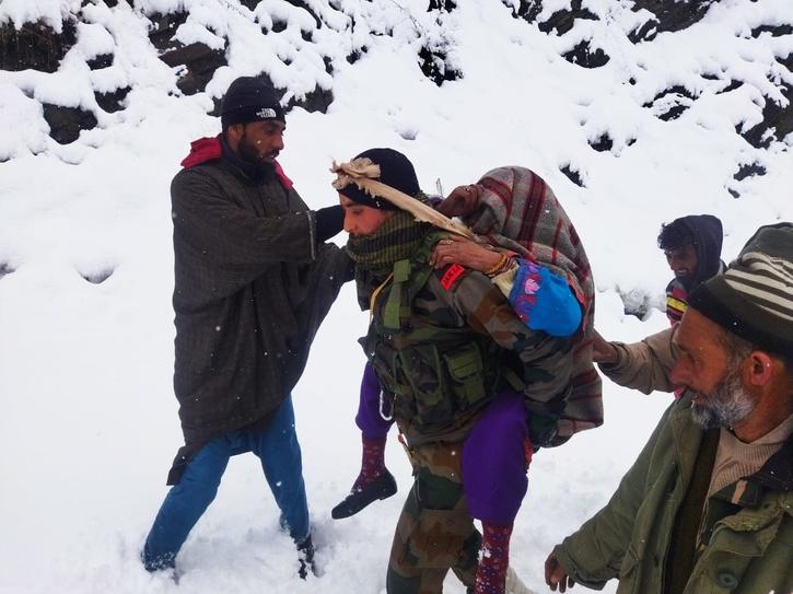 indian army saves 80 year old woman amidst heavy snowfall