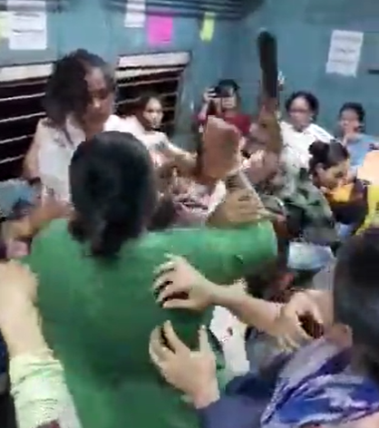Women's wrestling on the Kolkata local train 
