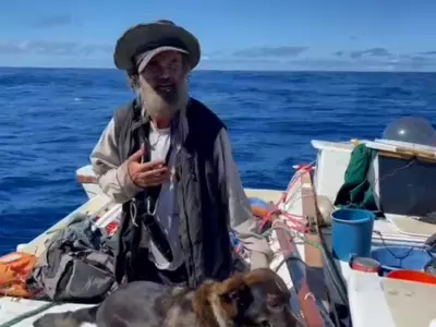 australian sailor pet dog stranded in pacific ocean for months rescued 