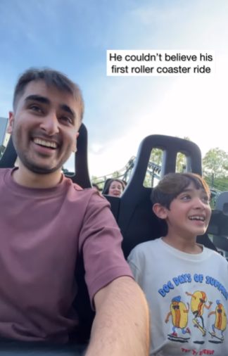 Boy rides a roller coaster for the first time