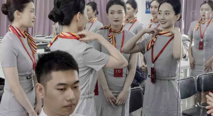 Chinese Airline Faces Backlash For Suspending Overweight Flight Attendants