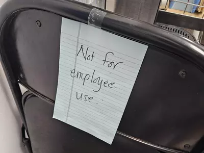store owner removes chair