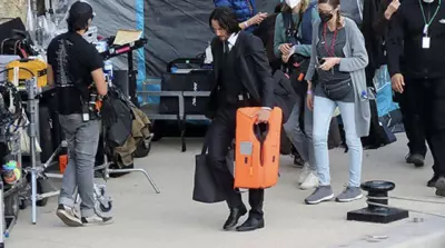 Video Shows Keanu Reeves Helping John Wick 4 Crew Carry Equipment