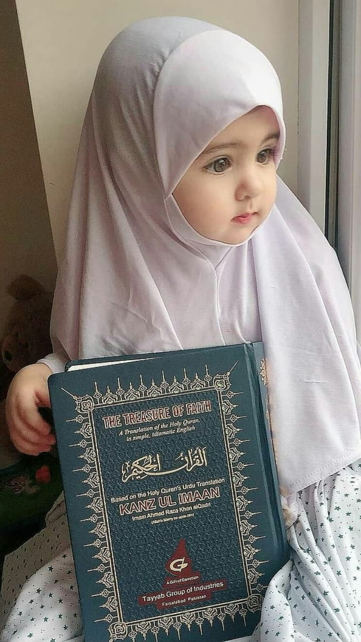 muslim baby boy with quran