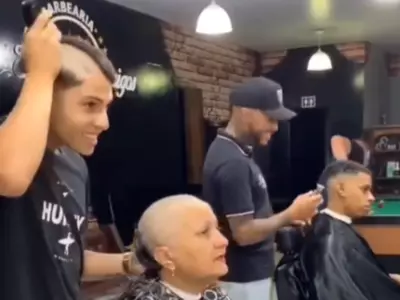 Barber Shaves Head To Support Mother Fighting Cancer