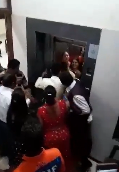The bride gets stuck in the elevator 