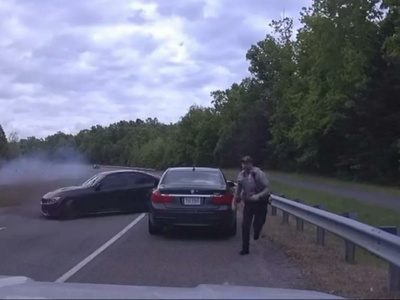 Caught On Cam: Out Of Control BMW 750 Car Nearly Hits Officer During ...