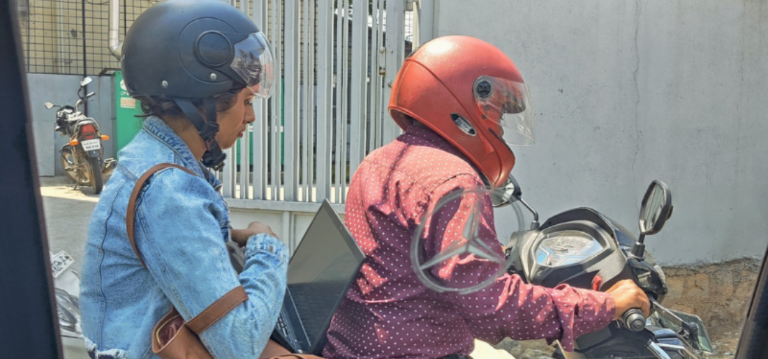 Bengaluru Woman Seen Working On Laptop Amid Traffic