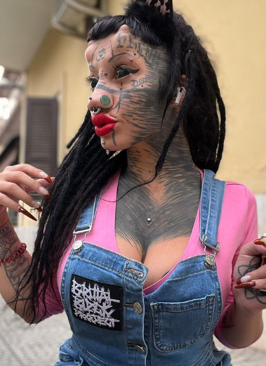 20 Body Modifications Make a 22-Year-Old Italian Woman Look Like a Cat
