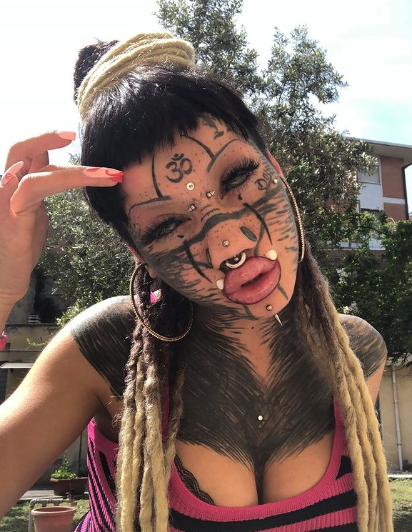 20 Body Modifications Make a 22-Year-Old Italian Woman Look Like a Cat