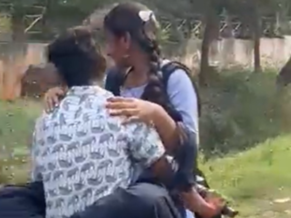 Andhra Pradesh couple hugs each other on moving bike