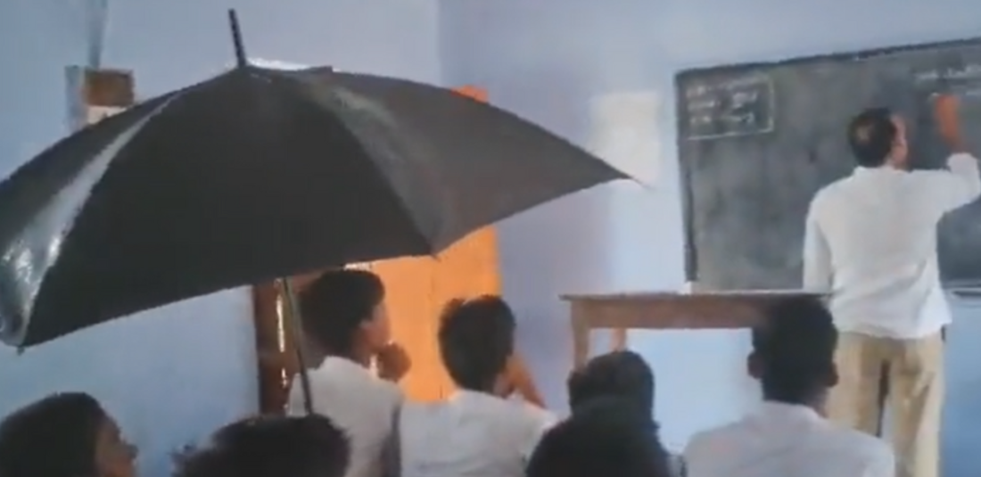 Bihar Students Use Umbrellas Inside Leaking Classroom Ceiling