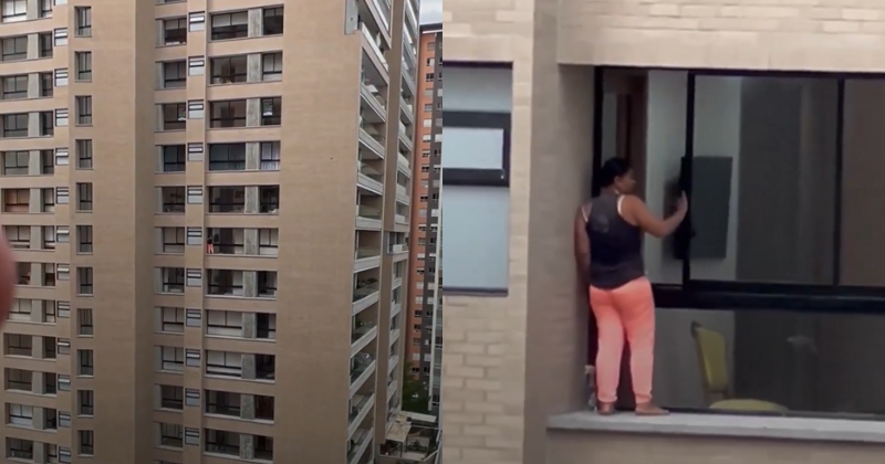 Woman Perched On High Rise Ledge Without Safety Gear