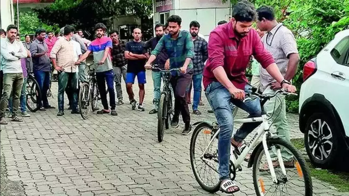  Engineers Line Up For Cycle Test to Become Peons in Kerala