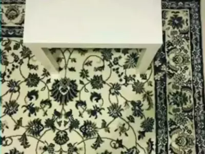 In This Optical Illusion, You Have To Find The Hidden Cell Phone Hidden In The Carpet