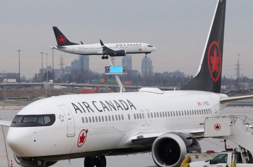 Passengers 'kicked off' plane after being made to sit in vomit-covered  seats