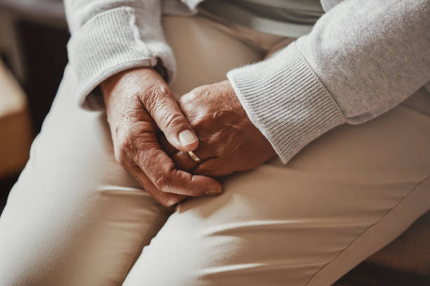 Sitting Position Hands Resting In Lap In Hindi/ istock