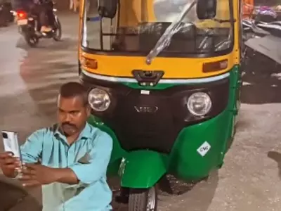 In Front Of His New Auto Rickshaw, A Man Took A Selfie