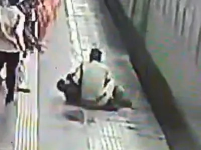 Viral Video RPF Officer Helps Man From Slipping Beneath Moving Train
