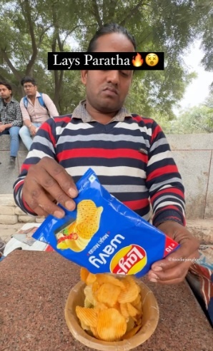 Online video shows street vendor filling parathas with chips