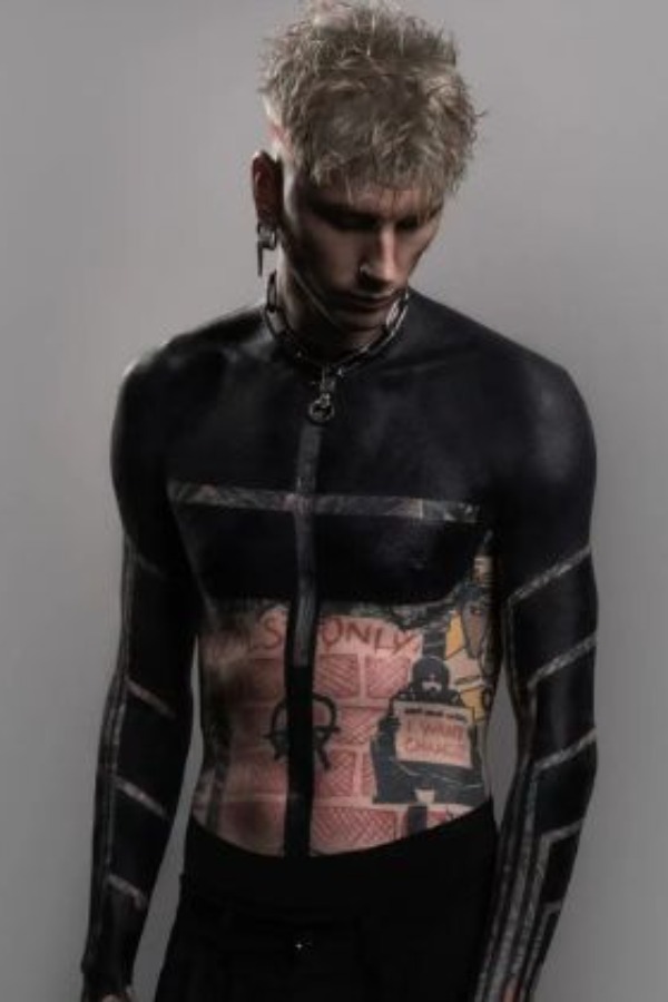 Machine Gun Kelly Covers Arms, Chest Tattoo With Black Ink | Life & Style