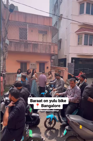 A groom and his wedding party arrive at the venue on Yulu bikes, sparking a viral video