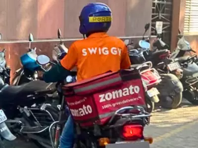 Swiggy Delivery Personnel Spotted Donning Zomato Gear