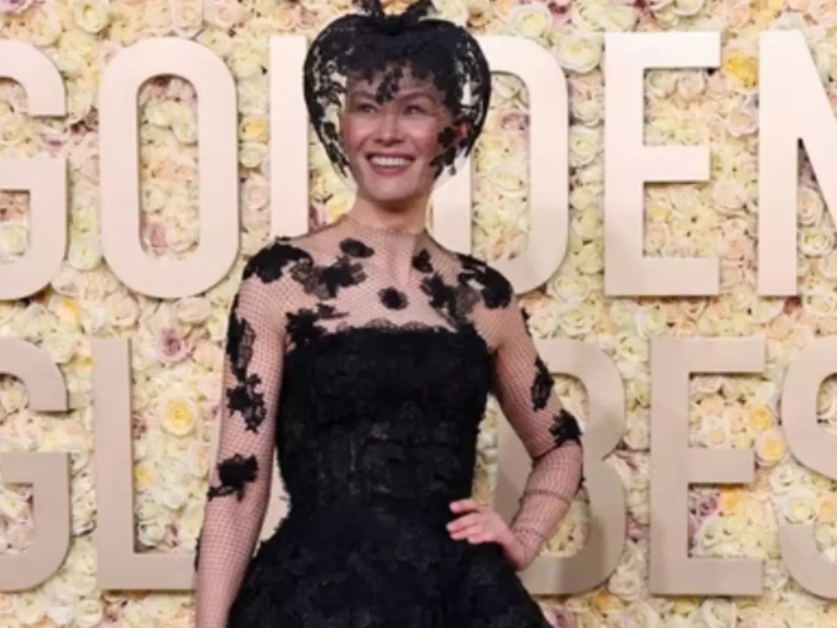 Rosamund Pike Dazzles In Black Lace Gown And Veil After Christmas Accident