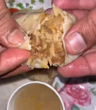 Internet calls it a crime for a Calcutta seller to put chicken biryani inside momos