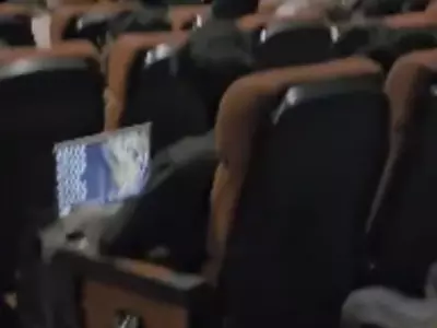 The Video Shows The Peak Bengaluru Moment Of The Day As A Man Works On A Laptop At The Cinema Hall