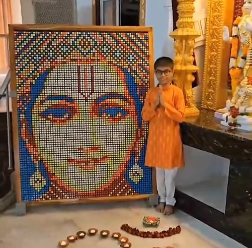     The young artist used a staggering 498 Rubik's cubes for this portrait.