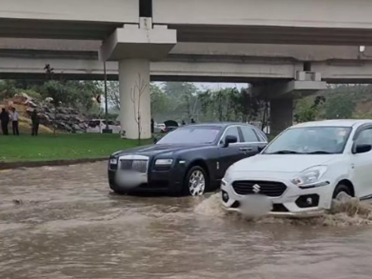 Viral video Rolls-Royce Ghost stranded in Delhi floods