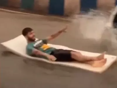 Pune man's unusual surfing on flooded streets leaves internet in splits