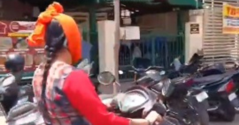 "Inventive Or Irresponsible? Bengaluru Woman's Phone 'Jugaad' On A Scooter Sparks Outcry