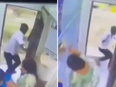 A Man Falls Off A Train While Attempting To Grab An Elderly Woman's Chain