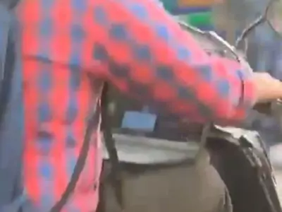 Bengaluru Man Attends Meeting While Riding Scooter With Laptop