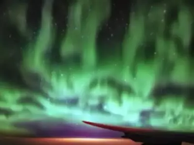 Pilot Captures Spectacular 'Turquoise Aerial Blaze' From Plane Window