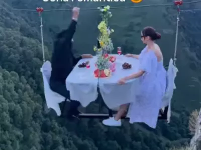 This Couple's Mid-air Dining Experience Is Not Intended For The Faint Of Heart