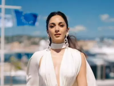 Kiara Advani Makes A Mesmerizing Cannes Debut In An Angelic White Gown For Rendezvous At Riviera