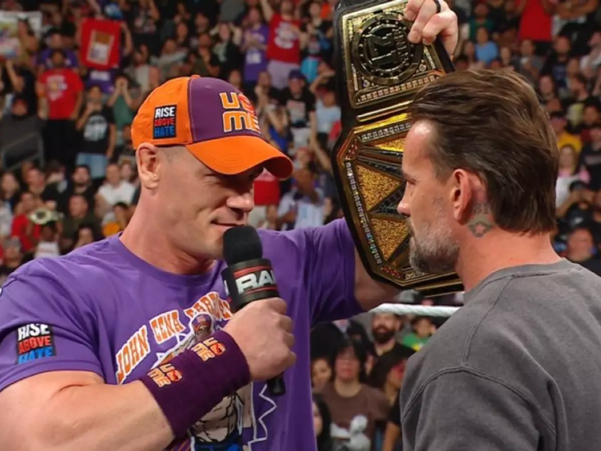 cenacm-68477f8da8e32 John Cena (L) with CM Punk. | Credit: WWE