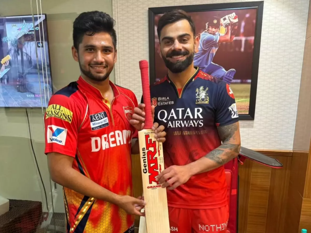 Fact check: Did Virat Kohli (left) call Musheer Khan (right) a 'water boy'? | Credit: X | @IamAMITkumar83 Fact check: Did Virat Kohli (left) call Musheer Khan (right) a 'water boy'? | Credit: X | @IamAMITkumar83
