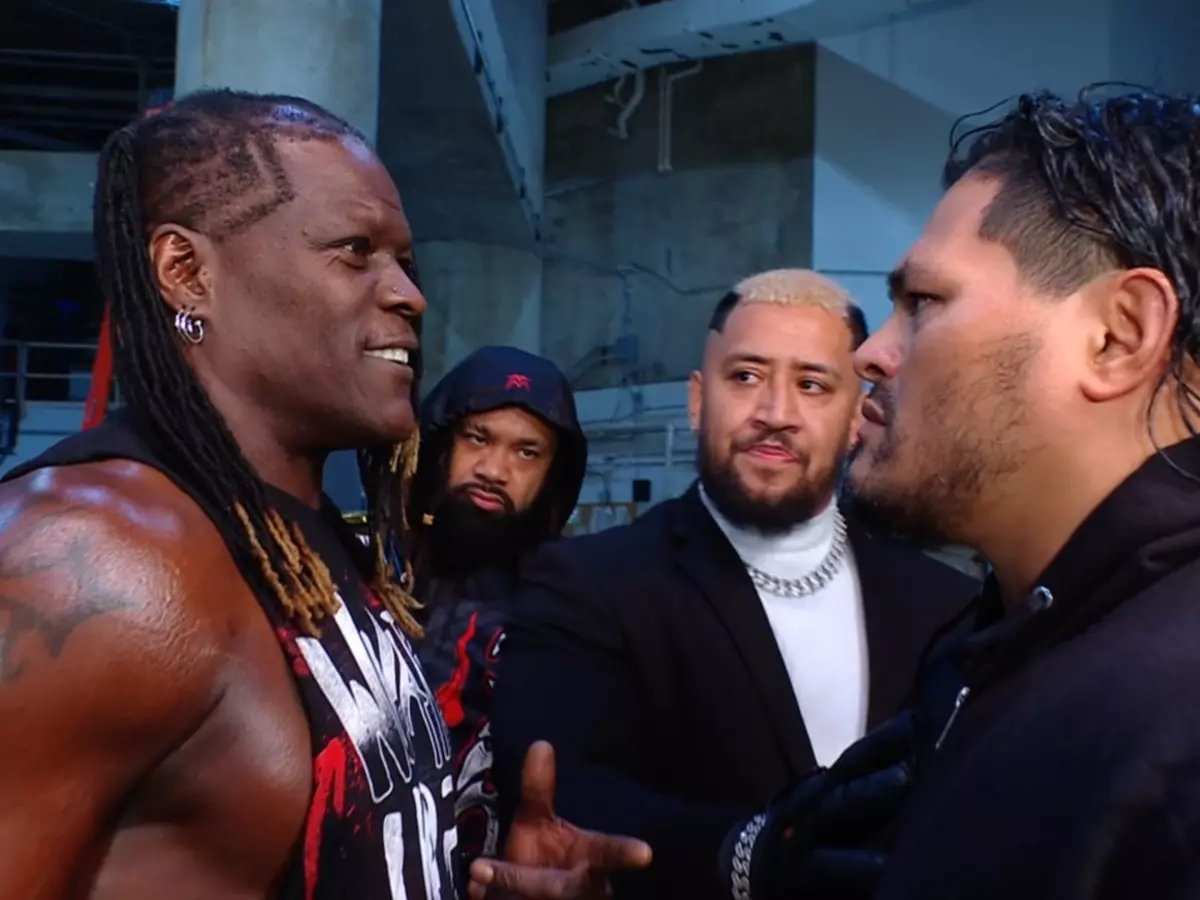 jc-683a5c2434491 R-Truth (L) with JC Mateo. | Credit: WWE