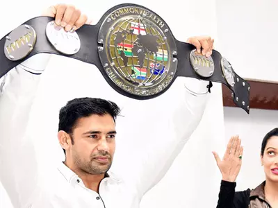 Sangram Singh with the WWP commonwealth title.