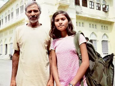 sushma verma, india's youngest postgraudate, with her father tej bahadur