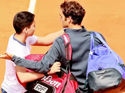 Federer with a fan