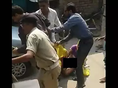 cops strip dalit woman