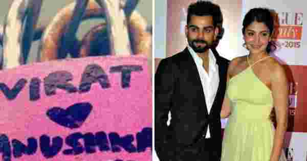 Peck it out! Virat Kohli and Anushka Sharma lock it with love