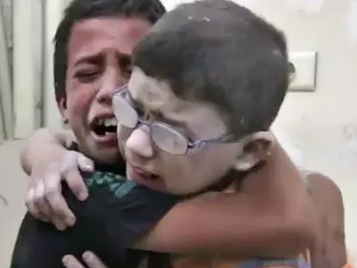 Heart-Wrenching Video Shows Two Boys Mourning Their Brother Who Was Killed In Syria Airstrike