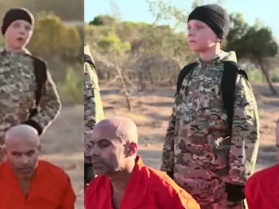 ISIS' New Propaganda Video Shows A British Boy Shooting A Prisoner In The Head In Syria
