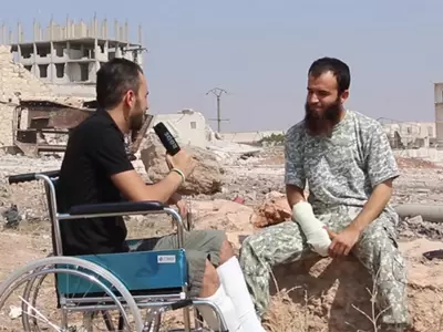 Syrian Journalist Reports From Wheelchair